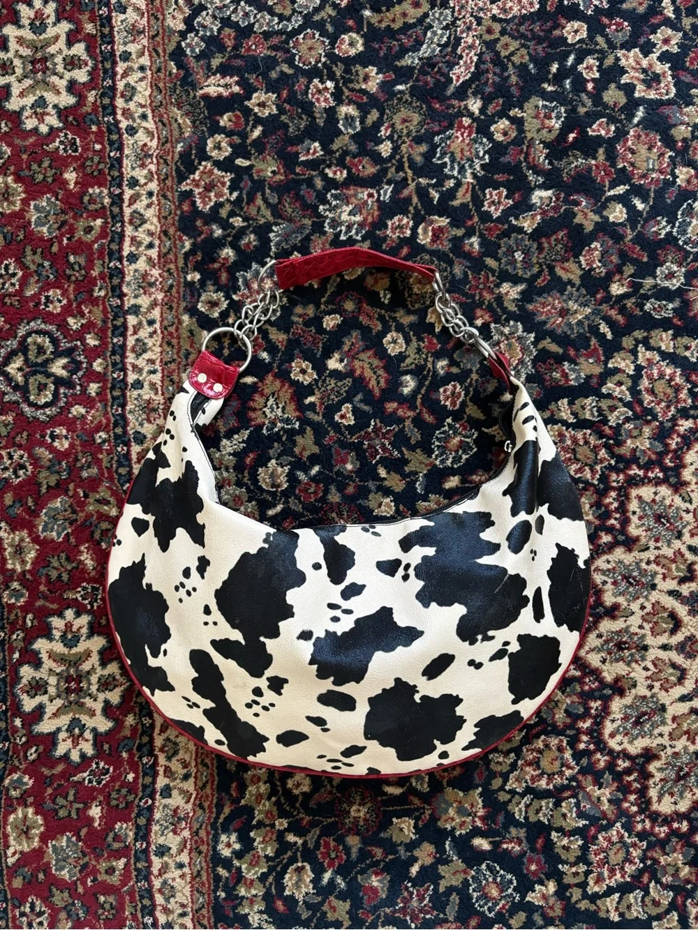 Cow-Print Black & Cream Hobo Bag with Red Trim
